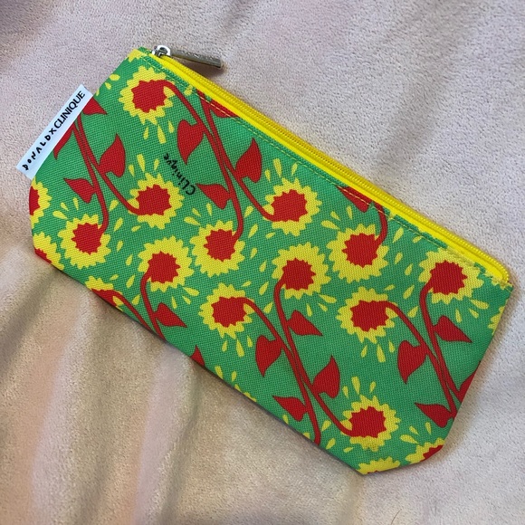Clinique Handbags - Donald x Clinique Makeup Bag with Free Sample